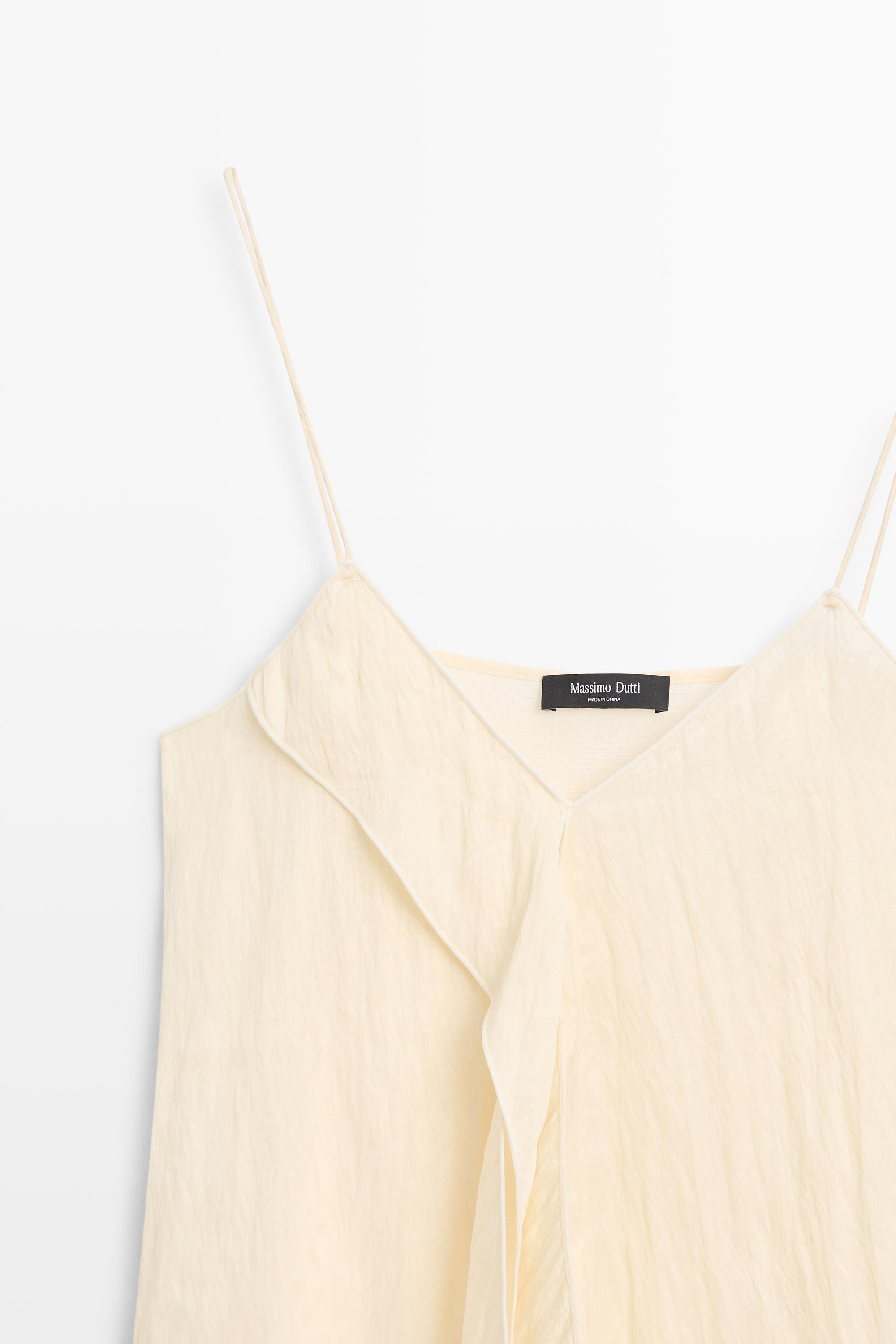 Strappy top with ruffle detail